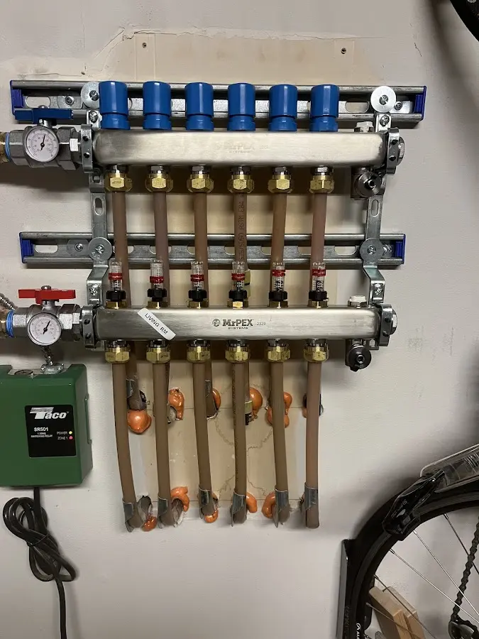 Plumber performing Water Heater Repair at a residential property in Artesia